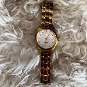 gold late spade watch